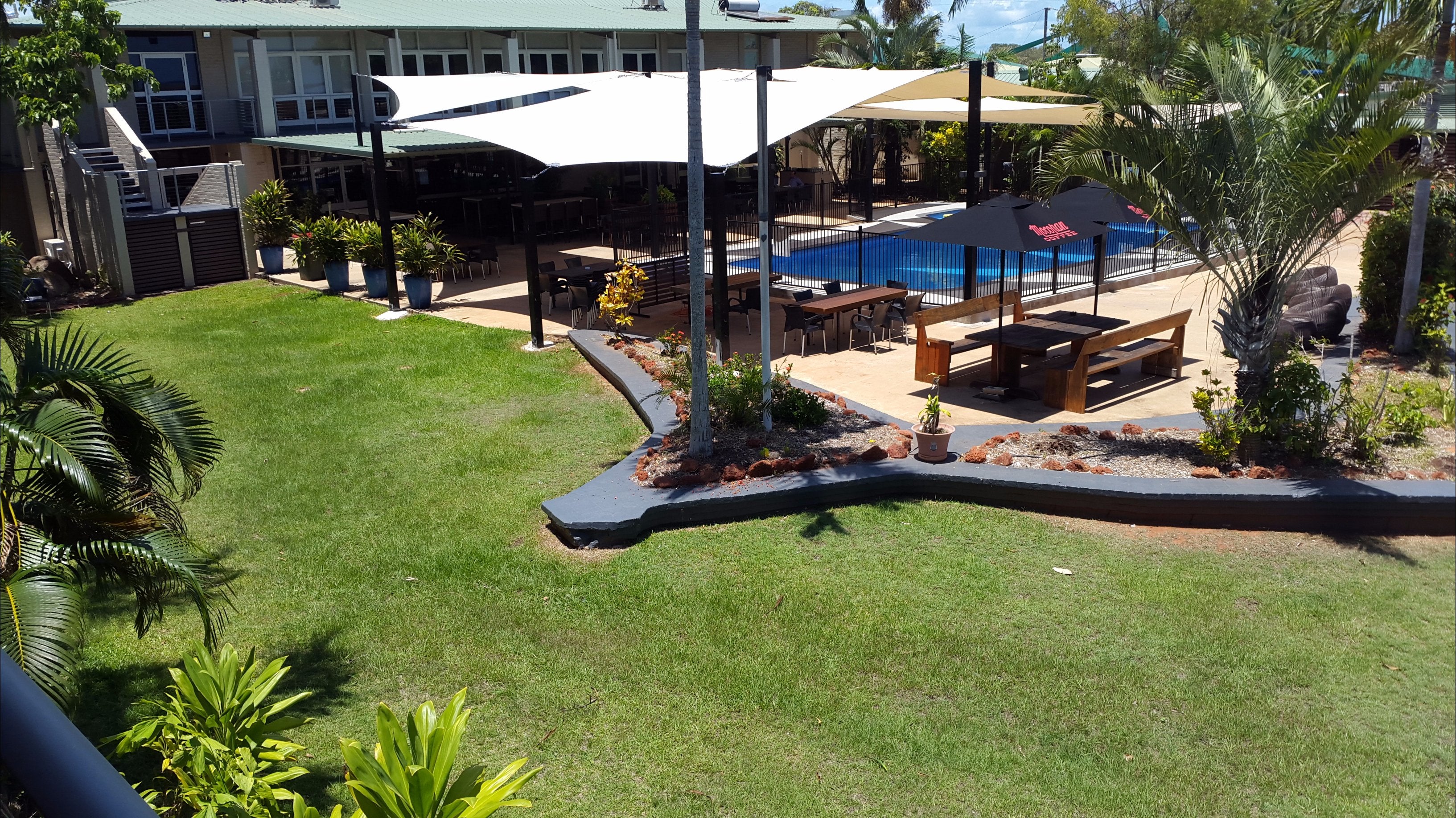 Lodge gardens, pool & restaurant area
