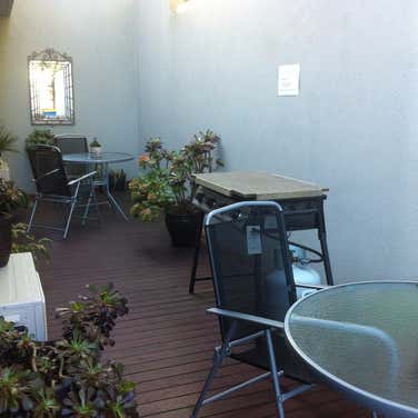 Verandah outside your unit, with gas bbq, outdoor sitting area