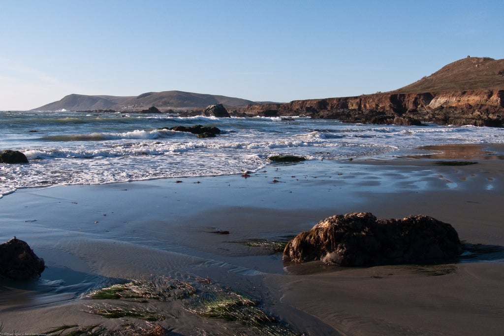 Low tide, looking north at Estero Bluffs, a CA State Park property, north of Cayucos
