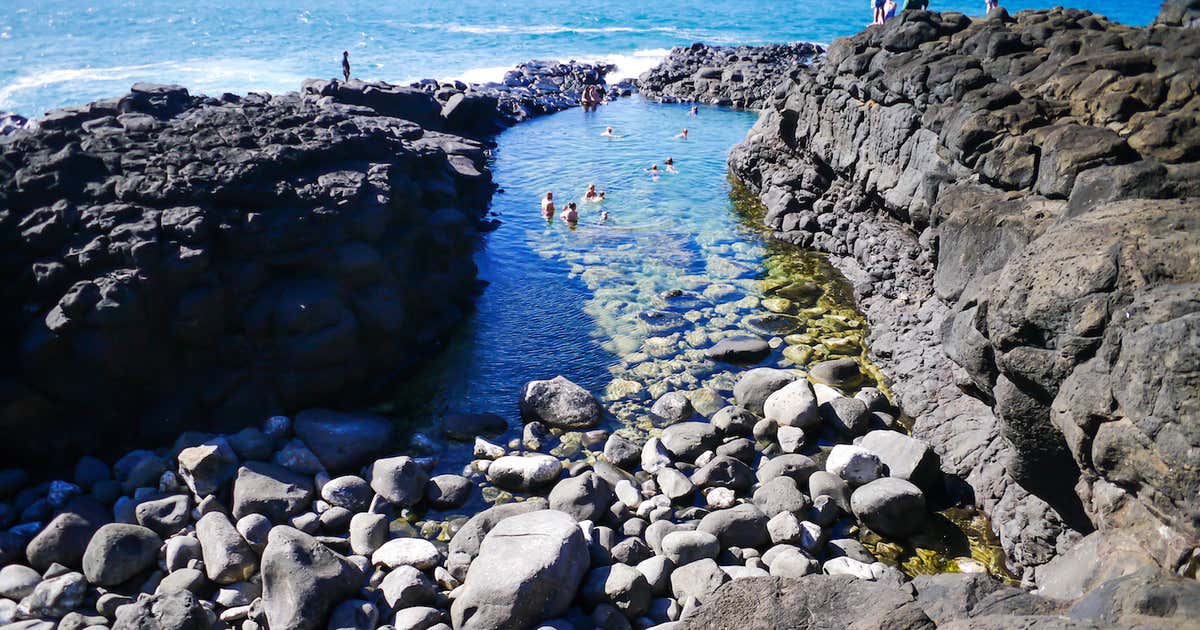 Bucket list alert: The Queen's Bath is a rad tide pool that also happens to be one of America's coolest swimming holes