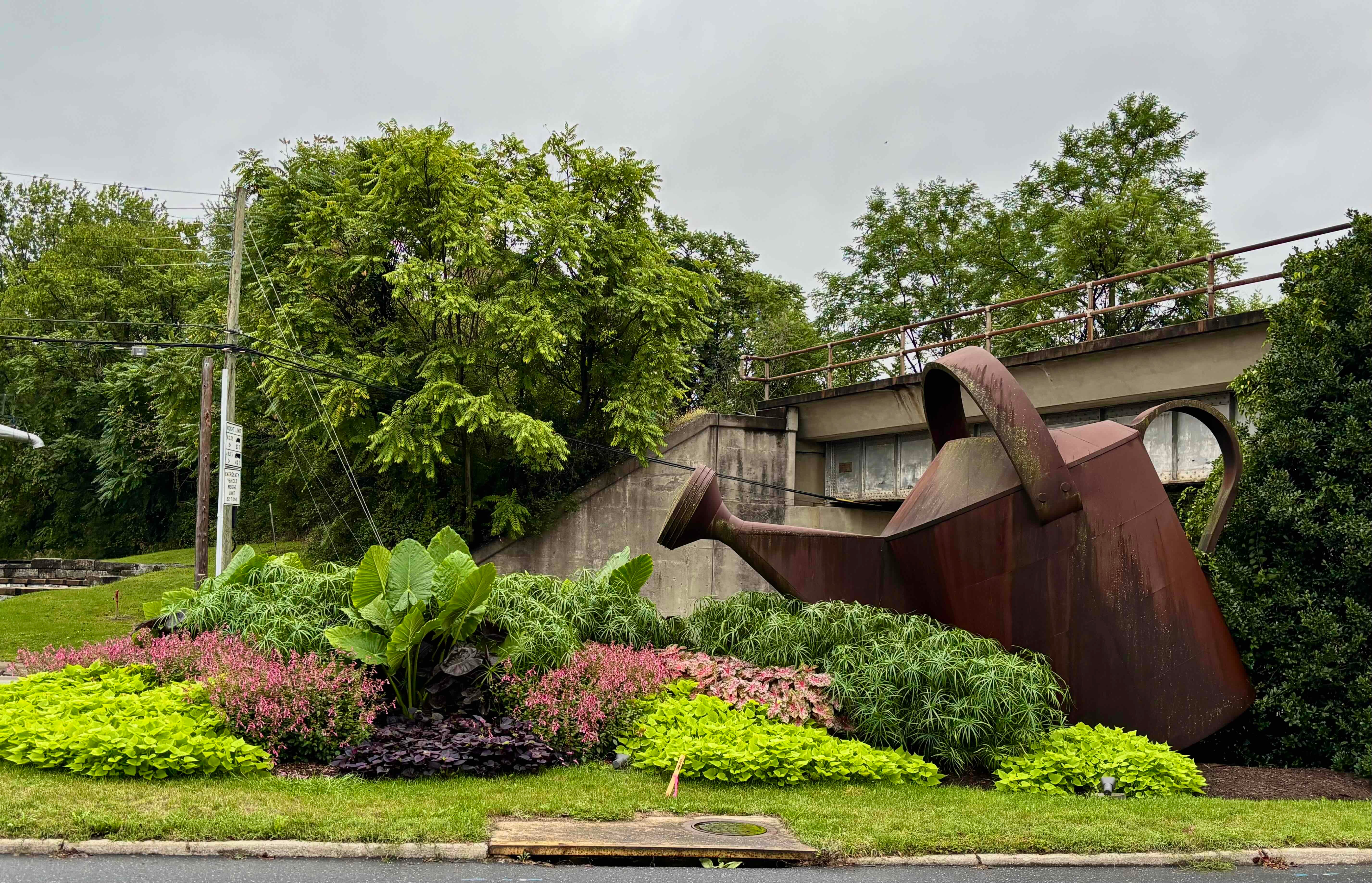 Giant Watering Can and Flower Pots