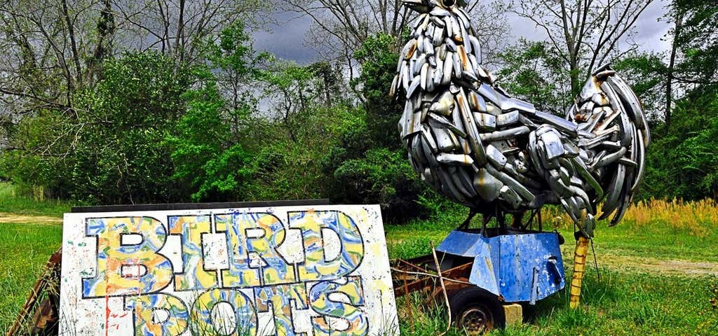 Photo of Big Rooster Made of Car Bumpers