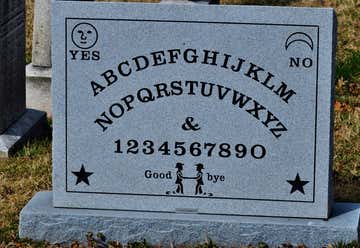 Photo of Ouija Board Headstone - Greenmount Cemetery