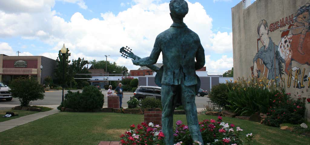 Photo of Woody Guthrie Statue & Murals