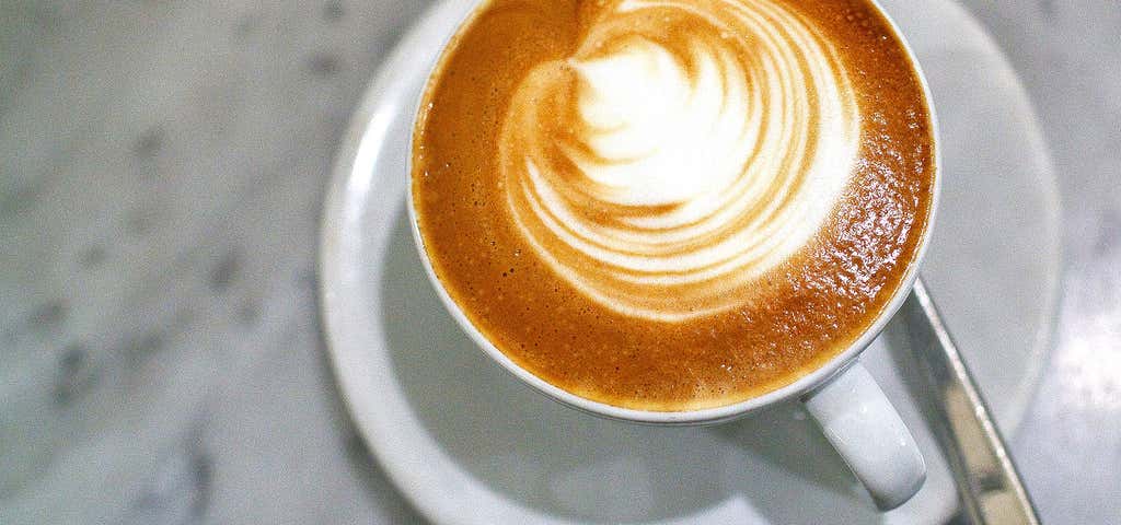 Photo of Tall Latte Cup-Shaped Espresso Drive Thru