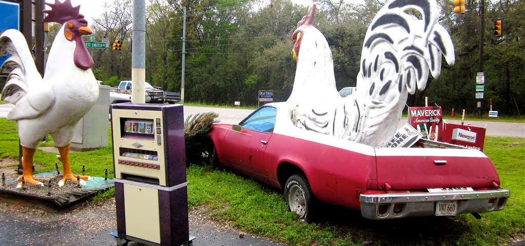 Photo of Chicken Statue and Car