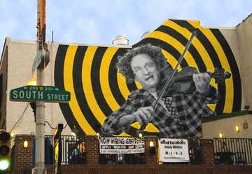 Photo of Larry Fine Mural