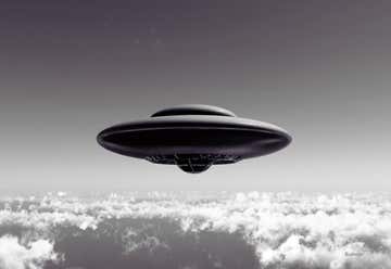 Photo of Flying Saucer with Transporter Beam