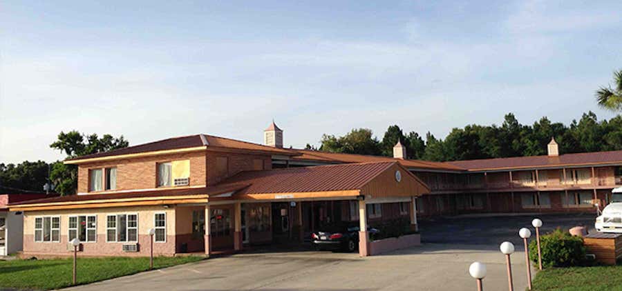 Photo of Best Host Inn And Suite