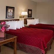 Standard Room 2 Queen Beds 1st Floor: <strong>2 Queen Beds</strong><br />Overlooking the hill<br /><br /><b>Layout</b> - Separate sitting area<br /><b>Internet</b> - Free WiFi <br /> <b>Entertainment</b> - Premium channels <br /><b>Food & Drink</b> - Coffee/tea maker and minibar<br /><b>Bathroom</b> - Private bathroom, deep soaking bathtub <br /><b>Practical</b> - Free local calls, iron/ironing board, and desk<br /><b>Comfort</b> - Air conditioning and daily housekeeping<br />Non-Smoking<br />Connecting/adjoining rooms can be requested, subject to availability <br />&nbsp;