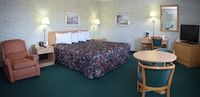 One king bed non smoking: <strong>1 King Bed</strong><br />300-sq-foot (28-sq-meter) room with courtyard views<br /><br /><b>Internet</b> - Free WiFi <br /> <b>Entertainment</b> - 39-inch LED TV with cable channels<br /><b>Food & Drink</b> - Coffee/tea maker<br /><b>Bathroom</b> - Private bathroom, a hair dryer, and a shower/tub combination<br /><b>Practical</b> - Free local calls, iron/ironing board, and desk<br /><b>Comfort</b> - Air conditioning and daily housekeeping<br />Non-Smoking<br />&nbsp;