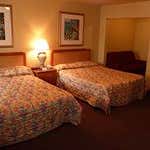 Double Room, 2 Queen Beds: &lt;strong&gt;2 Queen Beds&lt;/strong&gt;&lt;br /&gt;&lt;b&gt;Layout&lt;/b&gt; - Separate sitting area&lt;br /&gt;&lt;b&gt;Internet&lt;/b&gt; - Free WiFi &lt;br /&gt; &lt;b&gt;Entertainment&lt;/b&gt; - Premium channels &lt;br /&gt;&lt;b&gt;Food &amp; Drink&lt;/b&gt; - Refrigerator, microwave, and room service&lt;br /&gt;&lt;b&gt;Sleep&lt;/b&gt; - Premium bedding &lt;br /&gt;&lt;b&gt;Bathroom&lt;/b&gt; - Private bathroom, a hair dryer (on request), and a shower/tub combination&lt;br /&gt;&lt;b&gt;Practical&lt;/b&gt; - Free local calls, desk, and iron/ironing board (on request); rollaway/extra beds available on request&lt;br /&gt;&lt;b&gt;Comfort&lt;/b&gt; - Air conditioning and daily housekeeping&lt;br /&gt;Non-Smoking&lt;br /&gt;&amp;nbsp;